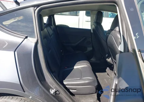 2023 Tesla Model Y Awd/Long Range Dual Motor All-Wheel Drive z USA, uszkodzony, nr VIN 7SAYGAEE1PF769999